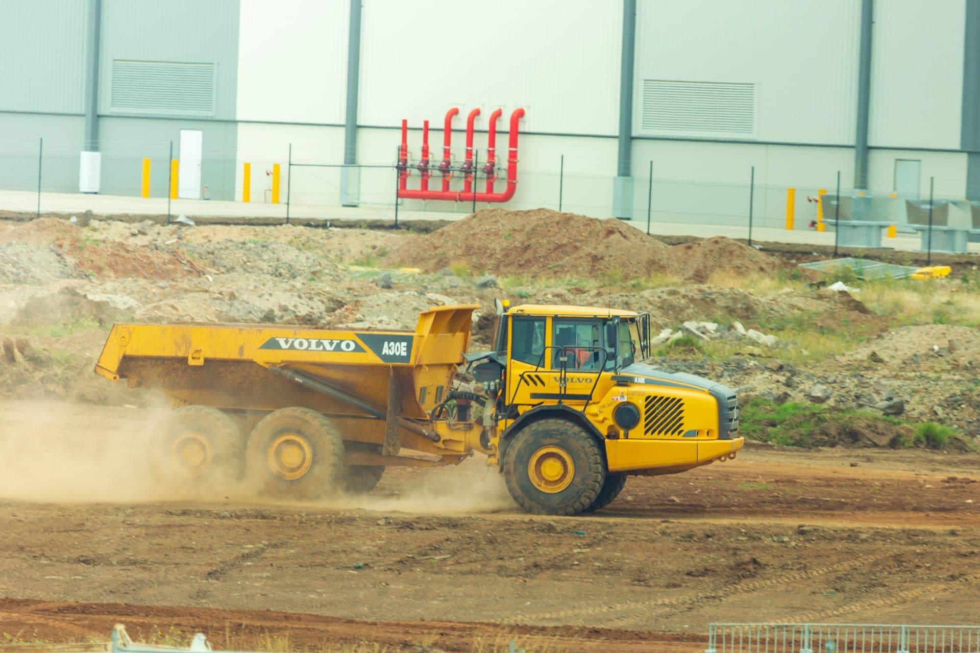 Volvo dump truck on an Australian construction site - plant and machinery finance for civil businesses