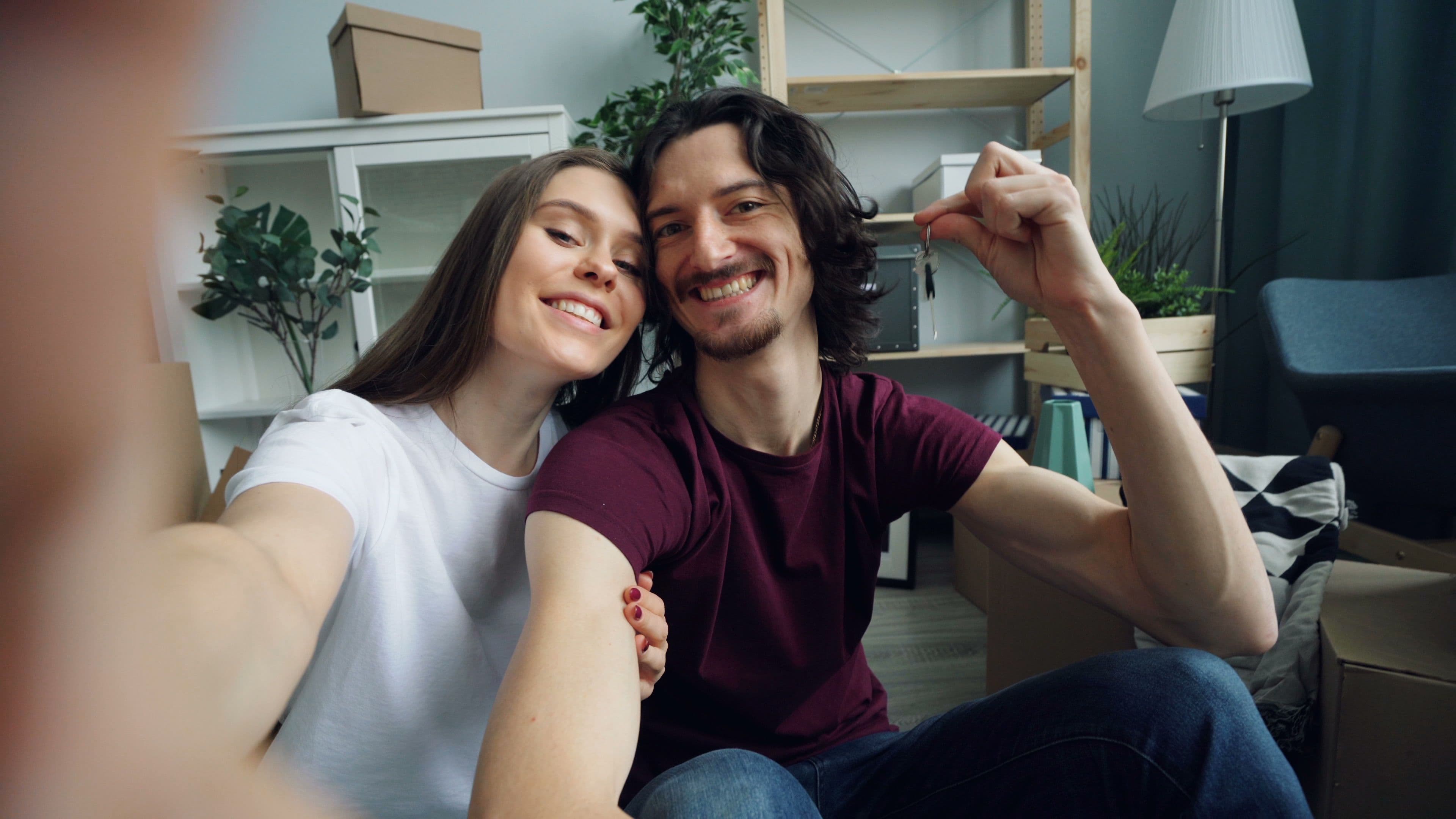 Couple celebrating their new home purchase